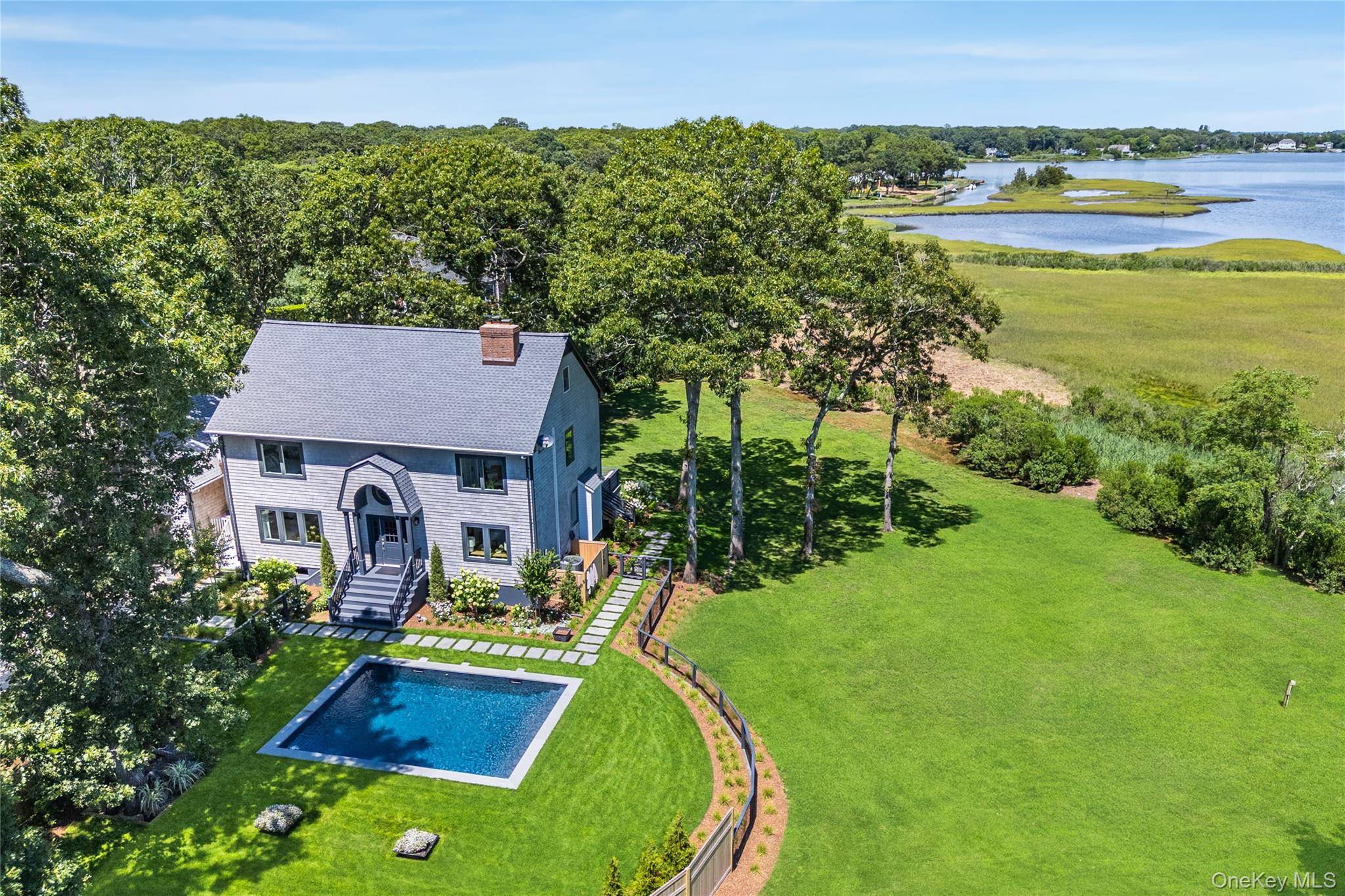 Stunning Waterfront Retreat w Modern Luxury on 4 Private Acres.