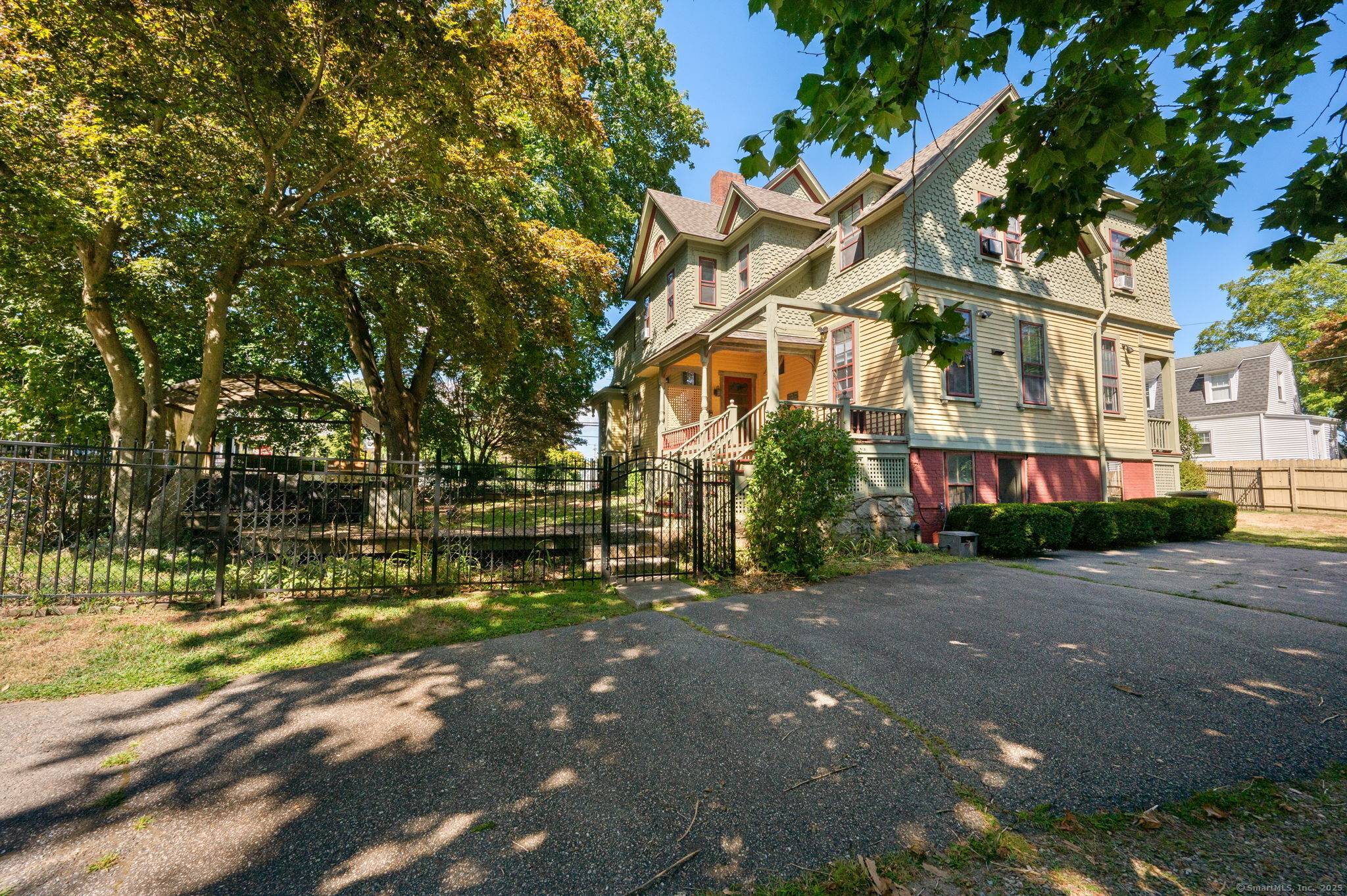 TIMELESS ELEGANCE MEETS MODERN COMFORT in this stunning 1887 Victorian.