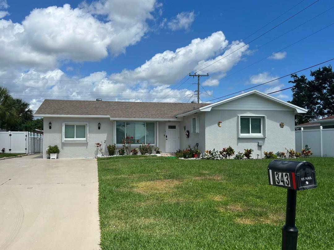 Ranch style home with 4 bedrooms and 2 baths in the heart of Palm Beach Gardens, No HOA restrictions.