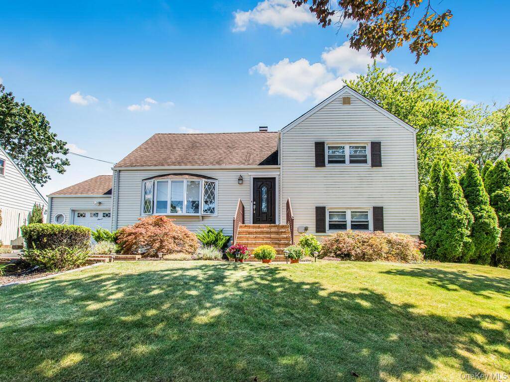 Welcome to this spectacular split level gem set above the road on gorgeous property featuring stunning wall to wall interior design.