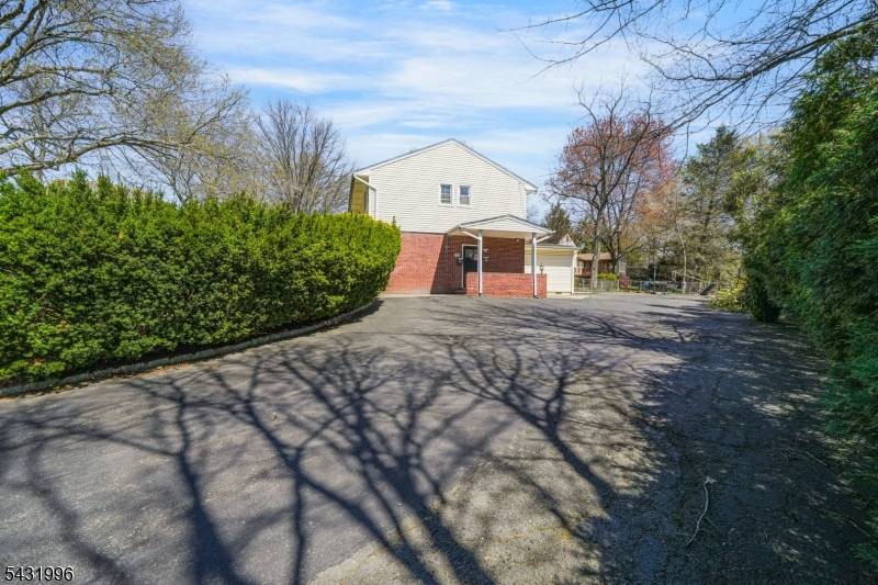 Beautiful 4 BD, 2 BA expanded split level home with modern updates throughout.
