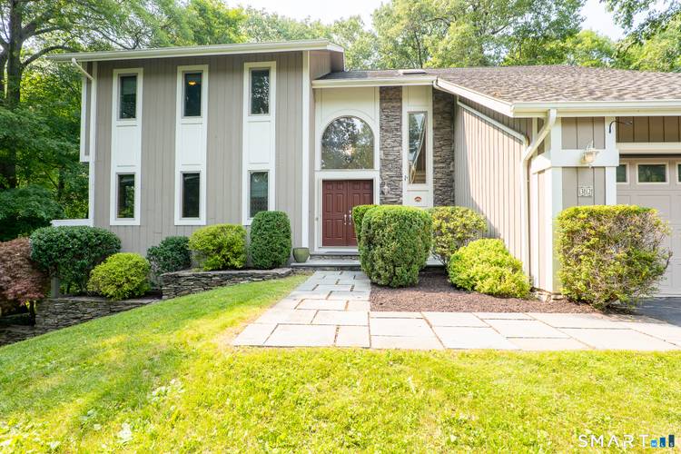PRICE IMPROVEMENT ! ! Exceptional pet friendly Contemporary on 2 professionally landscaped acres in one of Newtown's most sought after, centrally located neighborhoods.