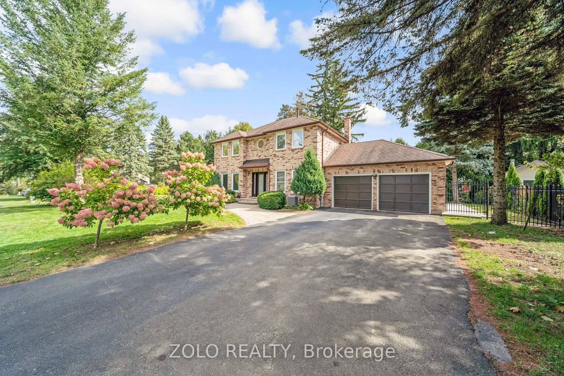 Custom built 88 on a gorgeous double lot in vibrant Caledon East newly renovated in 2023 with a bright, modern aesthetic.