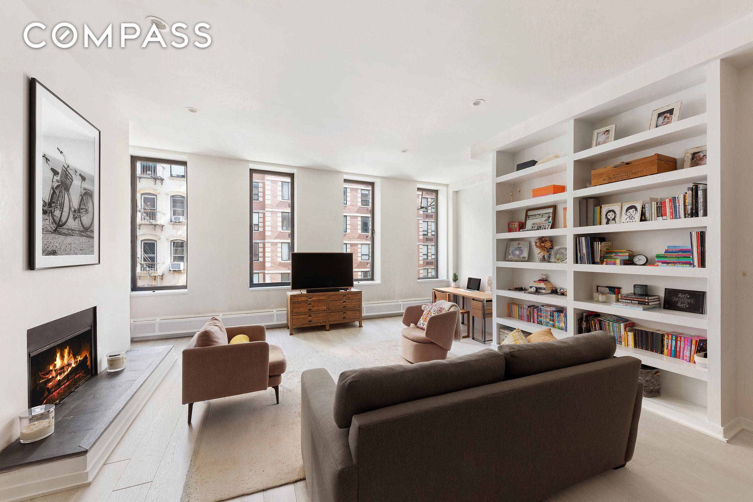 Introducing 150 Chambers 3W, a rarely available Tribeca condo featuring soaring 14 foot ceilings and an elegant wood burning fireplace that serves as the heart of the home.