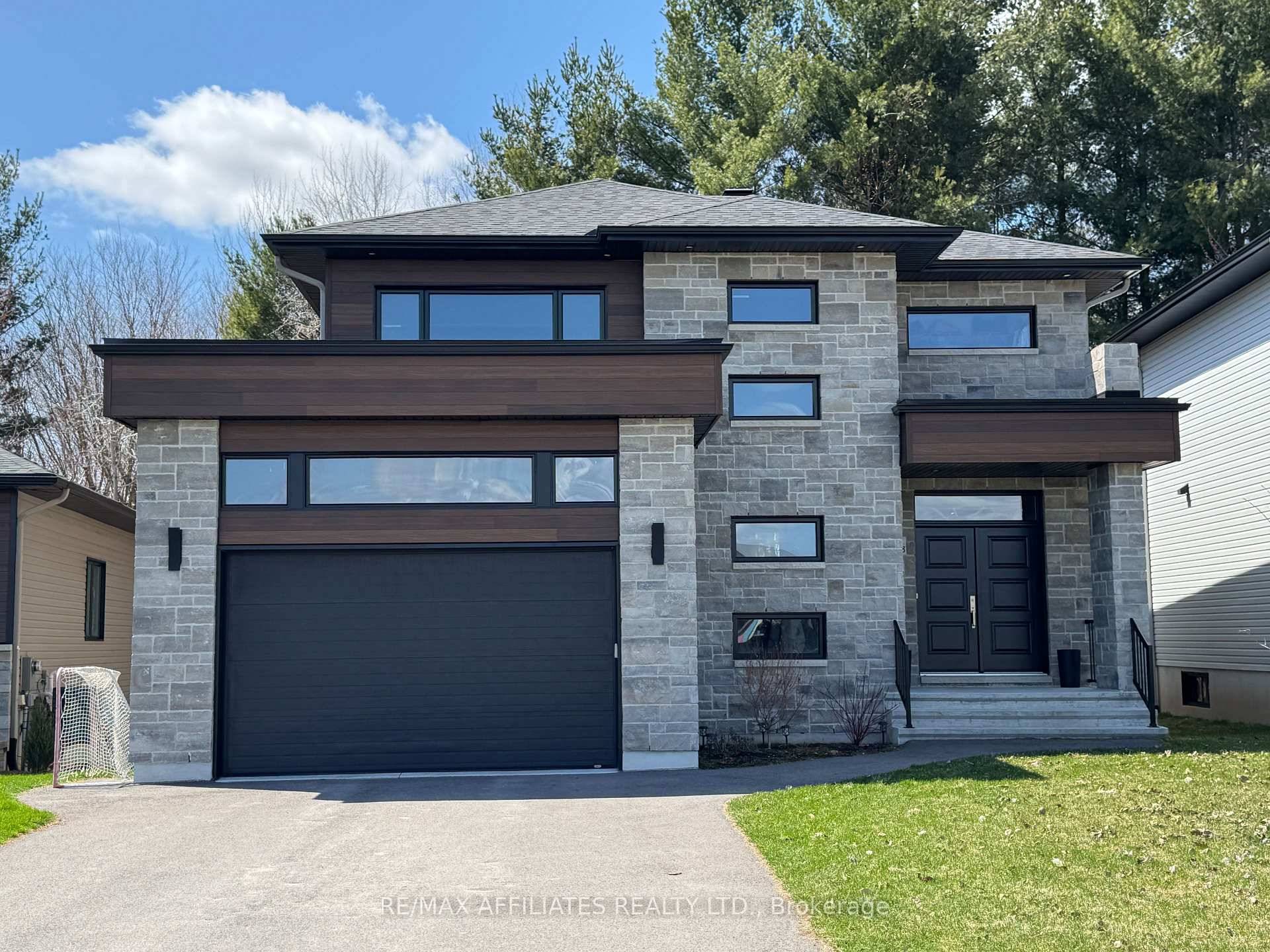 Luxury Meets Modern Elegance Stunning 2 Storey Home in Casselman Built 2021 Step into this architectural masterpiece, a contemporary 2 storey home designed for modern living, nestled in a serene ...