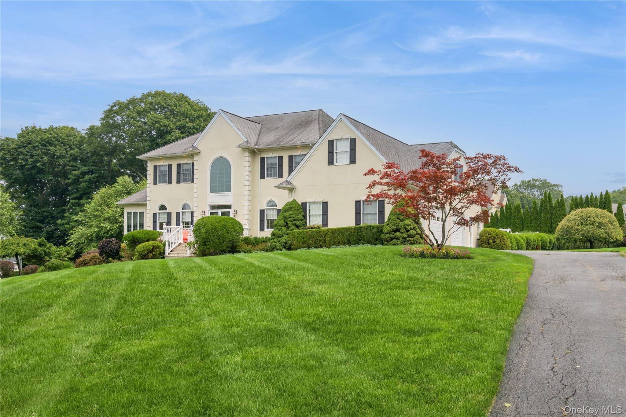 Welcome to this beautifully maintained center hall colonial with pool and luxury features in Willow Ridge.