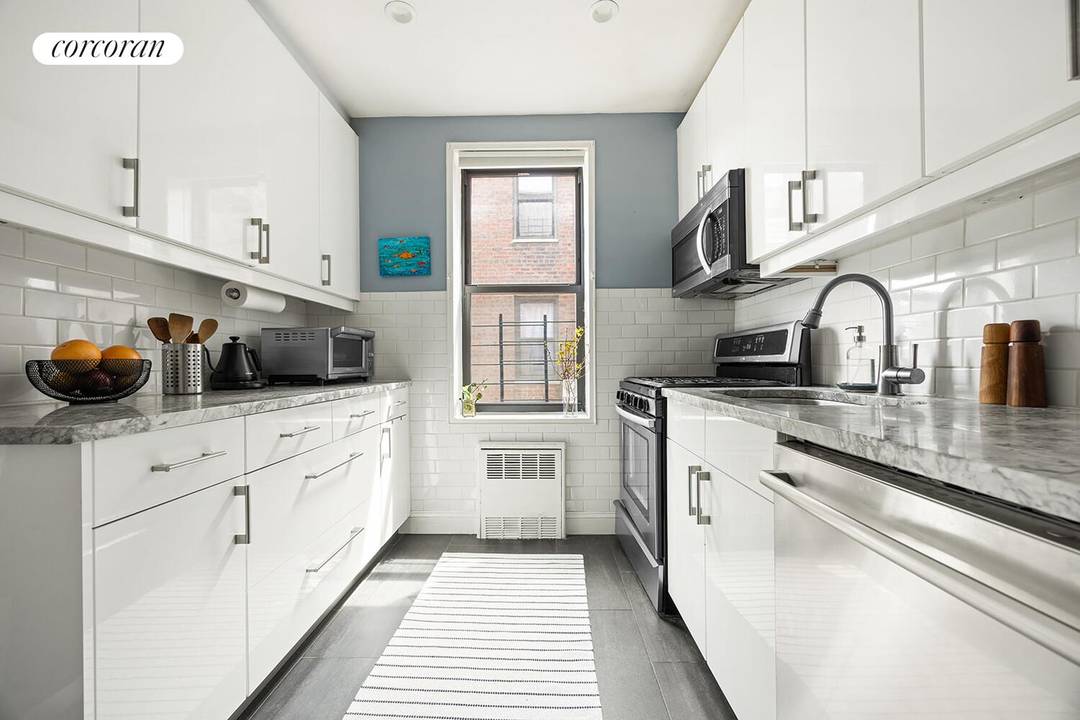 A rare opportunity to own a beautifully renovated two bedroom co op with a private outdoor space.
