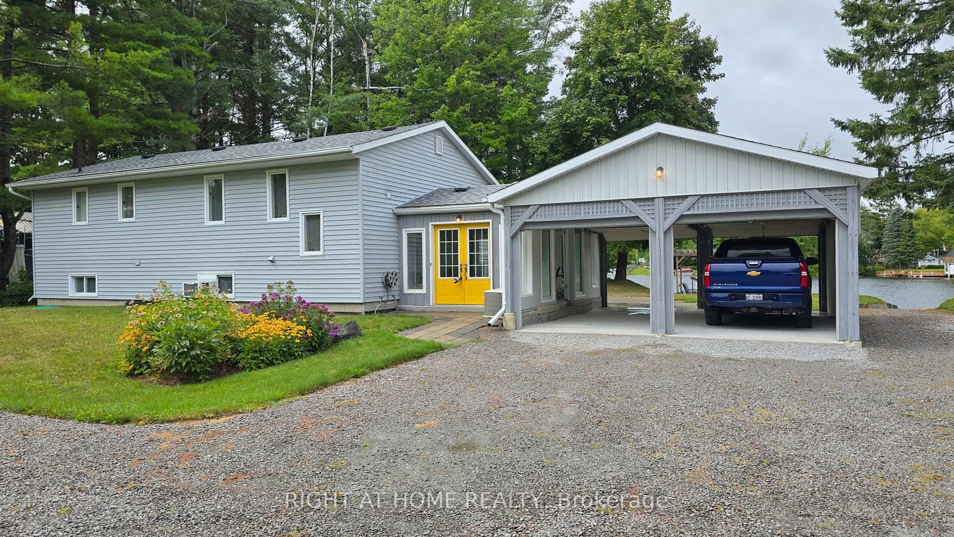 IF LOOKING FOR FOR A WATERFRONT PROPERTY THAT WOULD ACCOMMODATE YOUR LANDSCAPING, TRUCKING, EXCAVATING OR OTHER HOME BASE BUISINESS AND ALL THE WANTS AND NEEDS OF THE ENTIRE FAMILY THEN ...