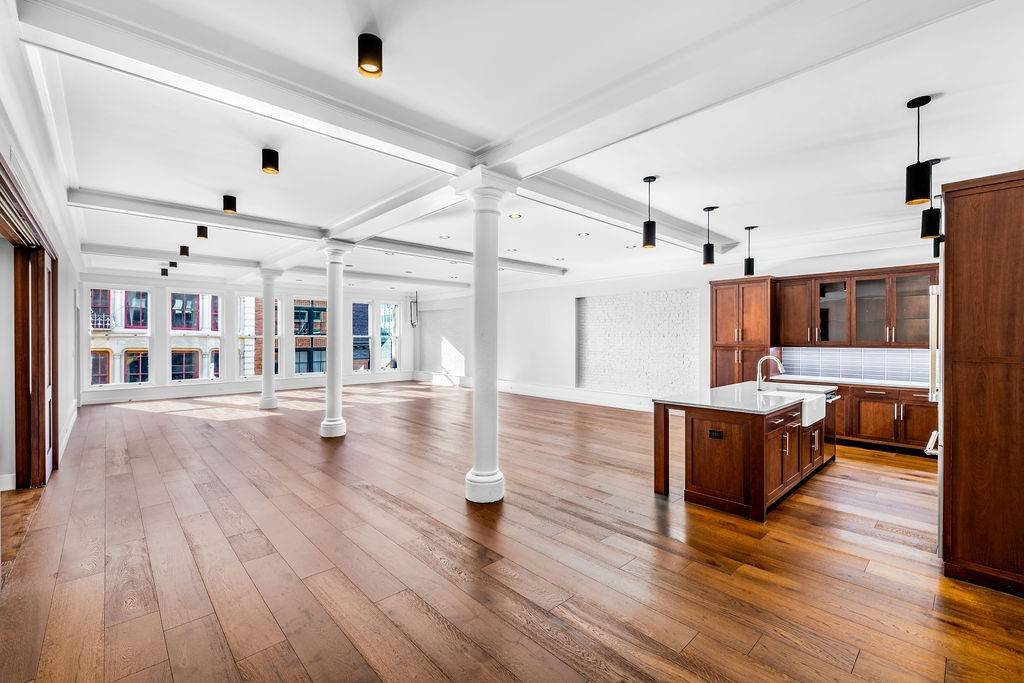 Be one of the first to live in this 40 wide renovated artists loft with downtown authenticity in the center of prime Soho.