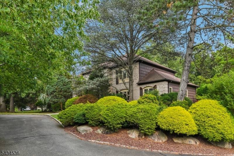 Nestled on a beautifully landscaped property in one of Livingston's most desirable neighborhoods, this custom built 12 room home offers exceptional space, quality craftsmanship, and resort style outdoor living.
