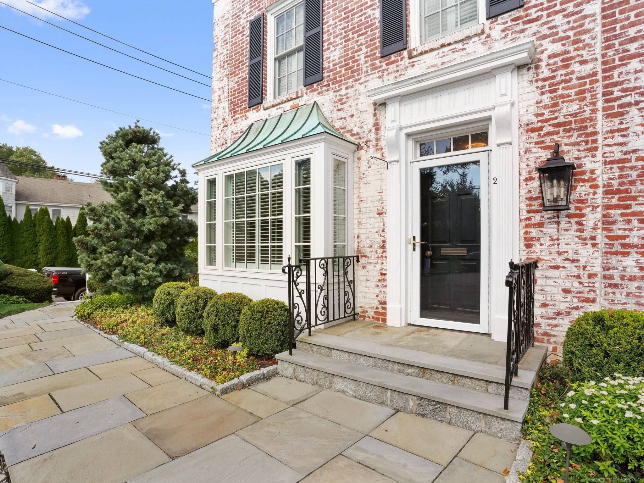 Not to be missed ! Beautifully renovated end unit in the sought after Canaan Square complex.