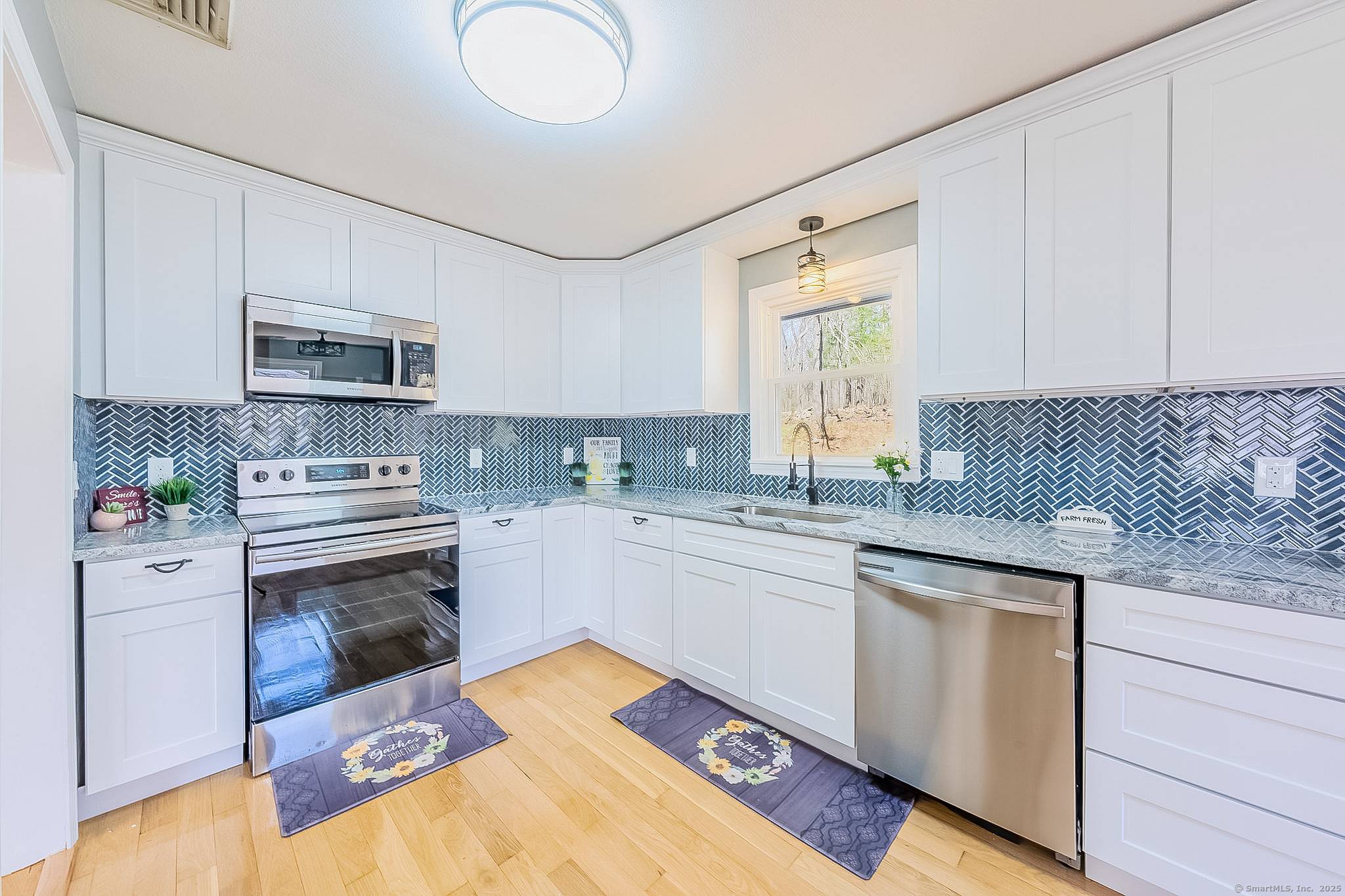 COMPLETELY RENOVATED WOODLAND OASIS IN SOUGHT AFTER WESTFIELD !