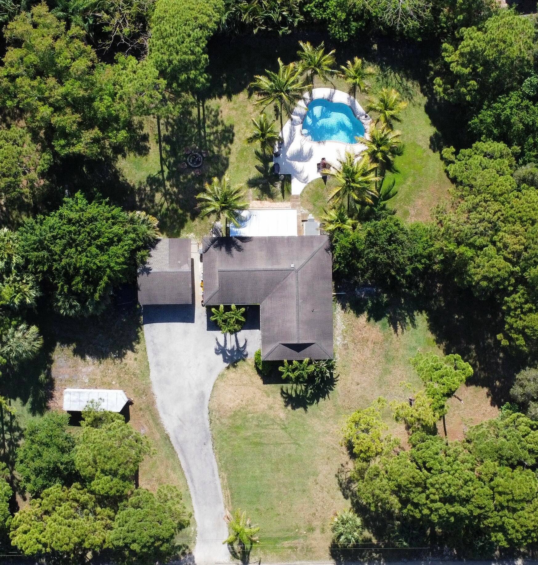 Welcome to your dream home in the highly desirable Palm Beach Country Estates !