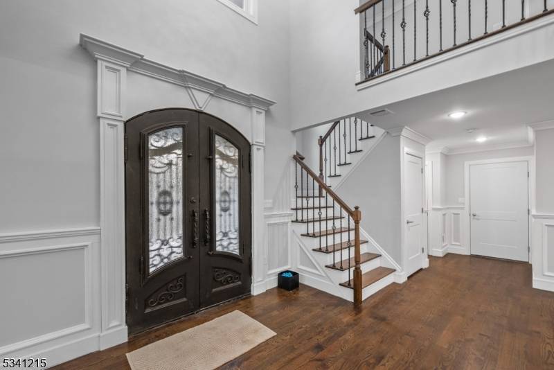 Experience luxury living in this stunning new construction home, perfectly situated in the sought after Sleepy Hollow section of Plainfield.