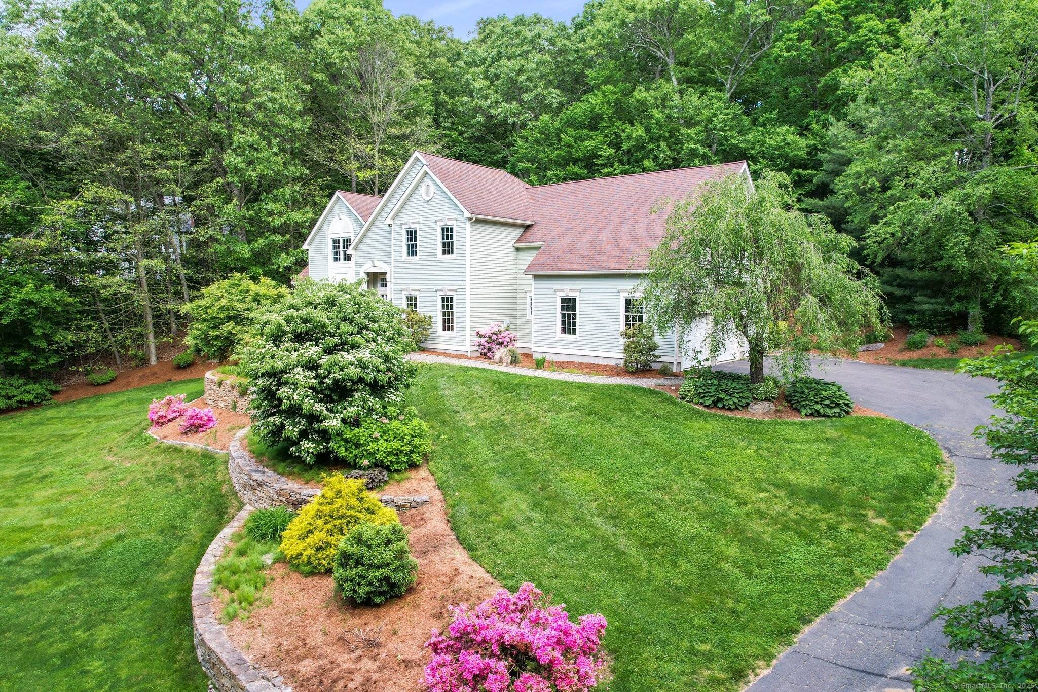 Bright and updated colonial located on over an acre lot in a quiet neighborhood close to town and Hebron Elem School.