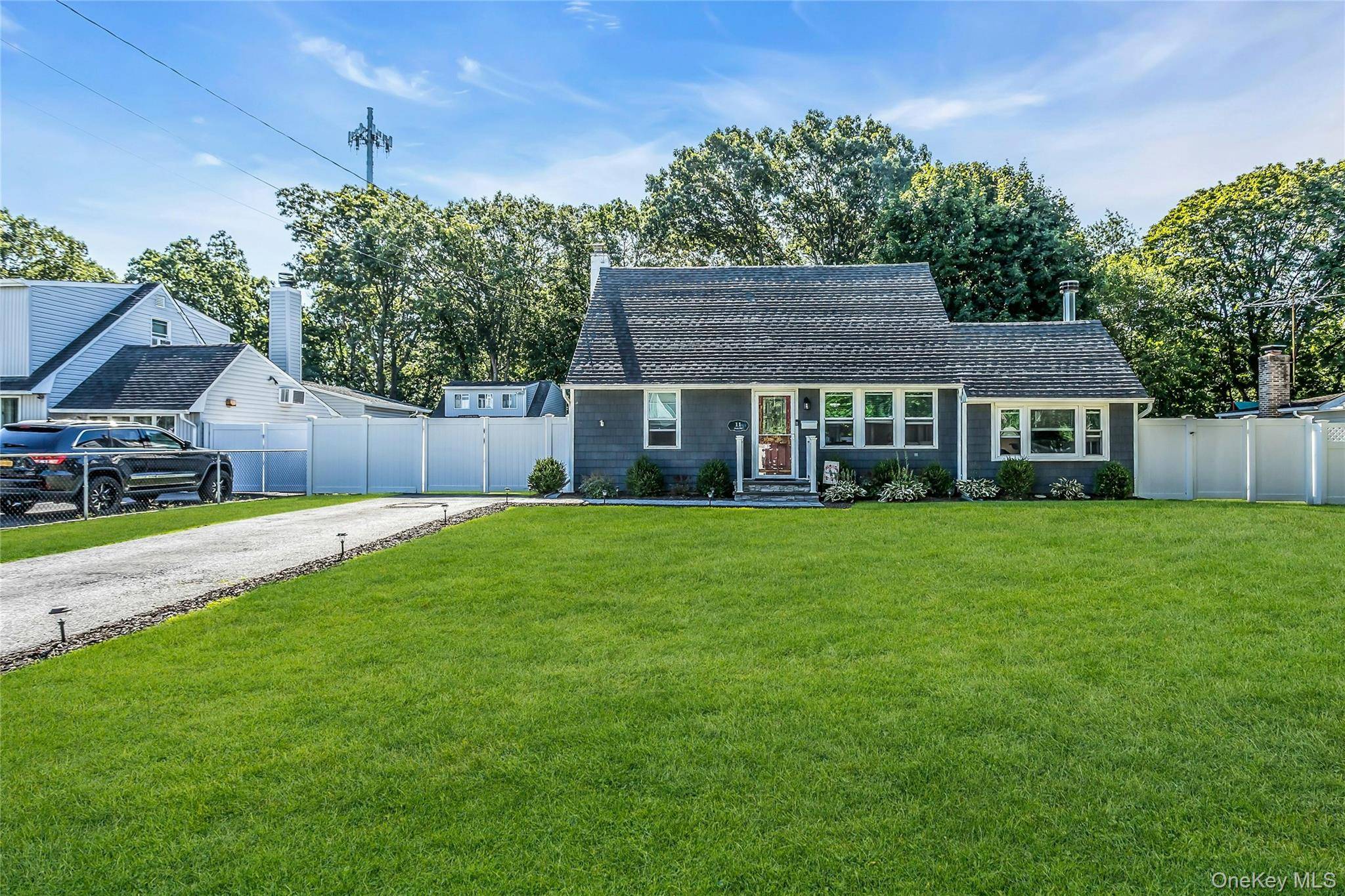 Welcome to this Meticulously Updated 4 Bedroom Expanded Cape in West Islip Schools !
