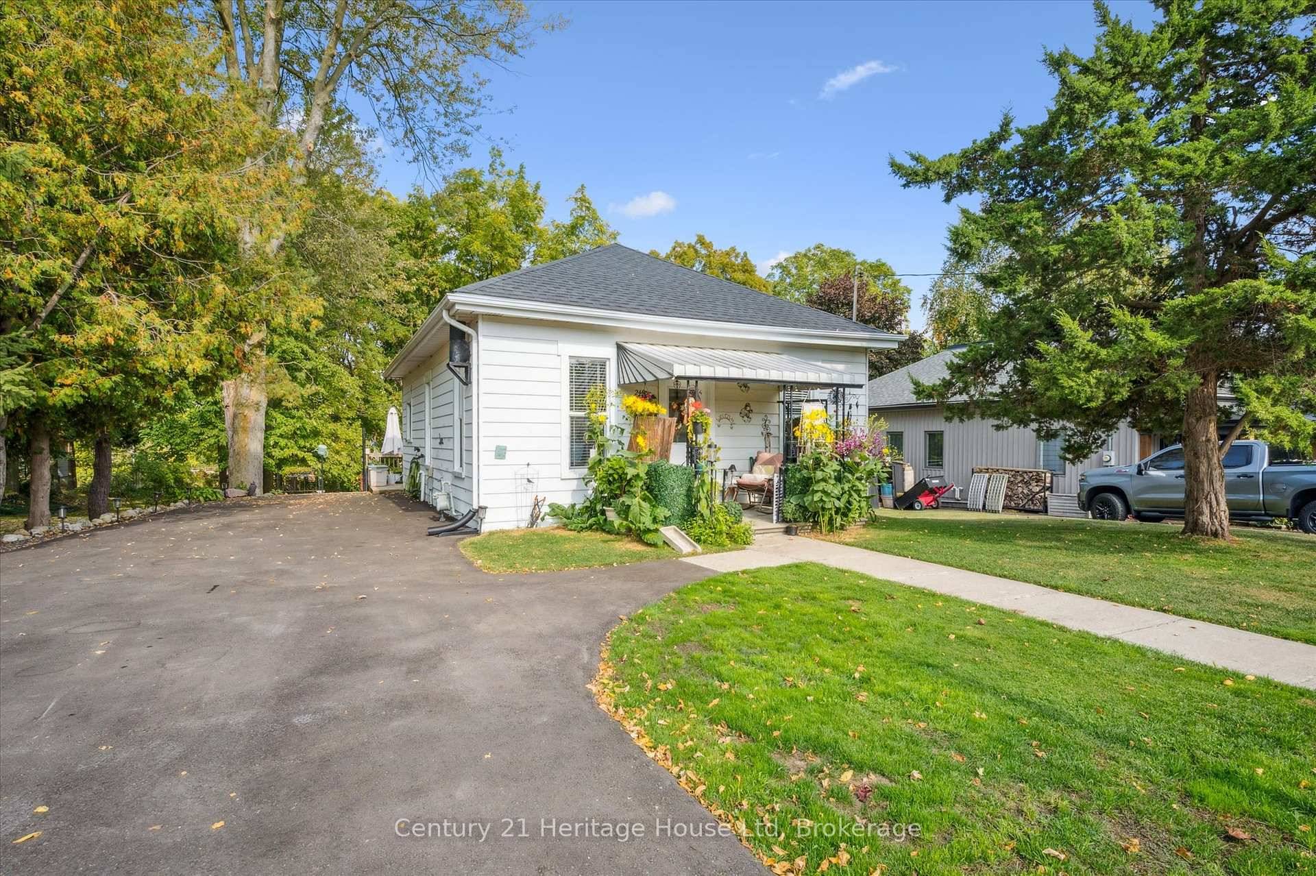 Step into this stunningly renovated 2 bedroom bungalow, where modern finishes meet timeless charm.