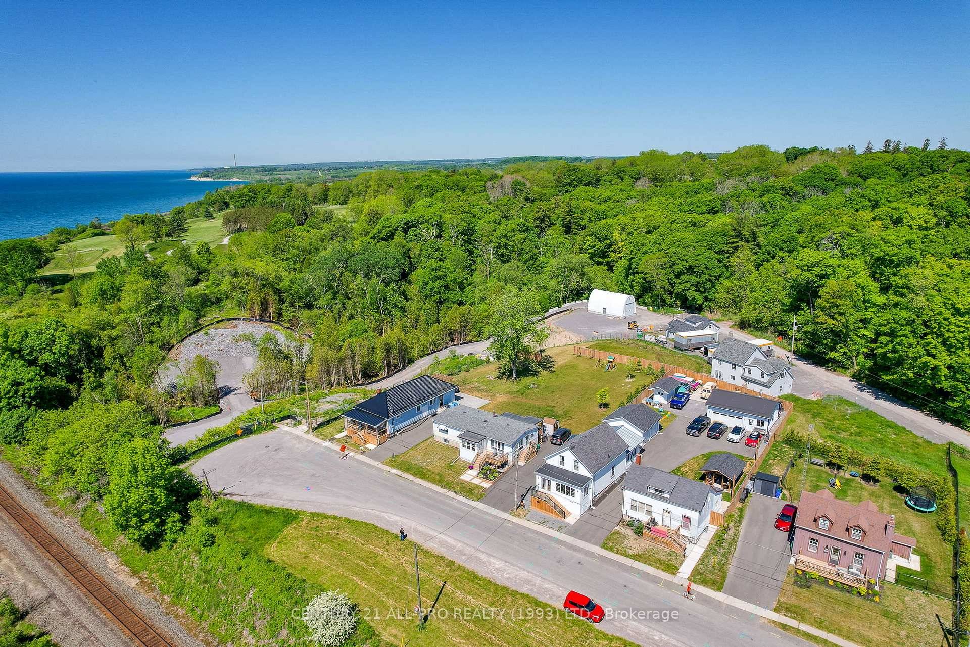 Lakeview Home on an oversized, private, fenced lot with lots of parking for boat, trailer, several cars.