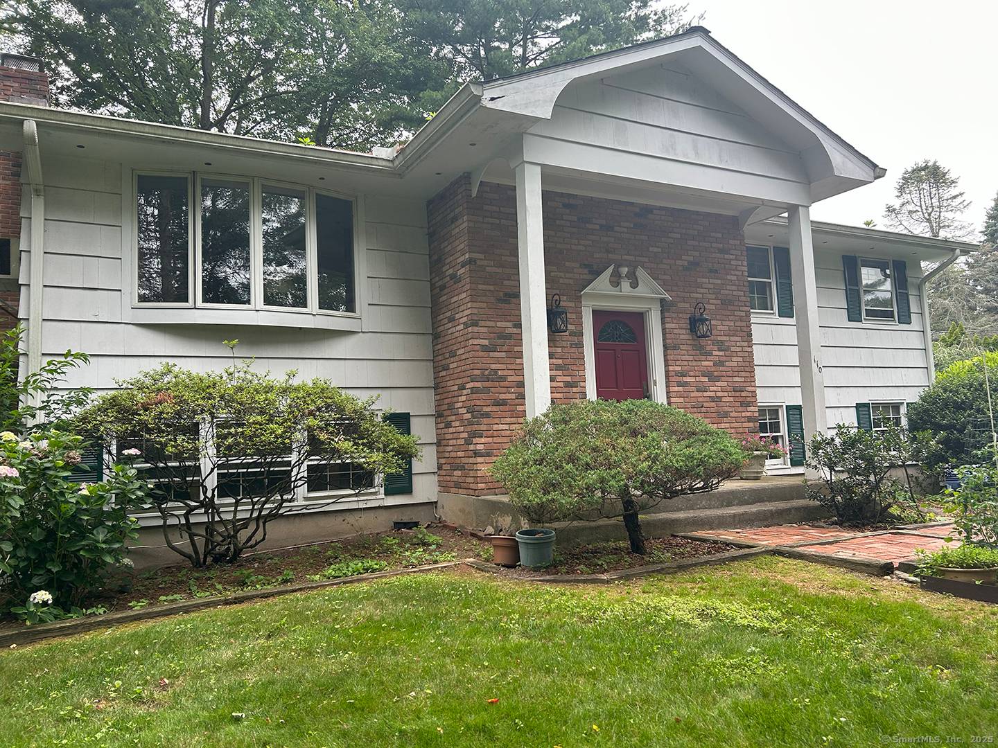 Excellent Location. Private corner lot on a quiet cul de sac on the Westport border.