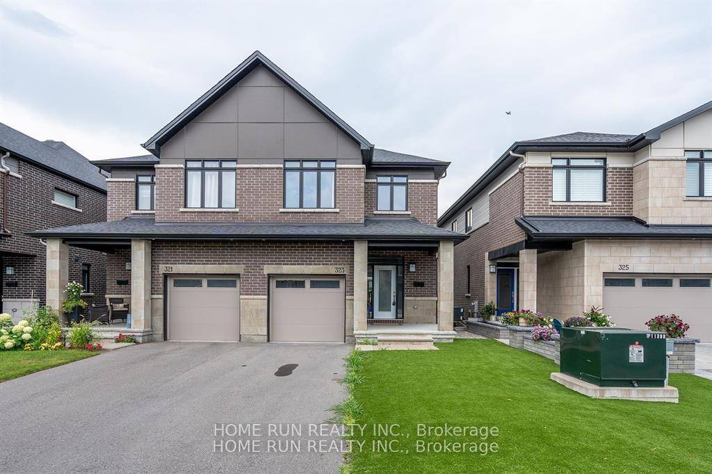 Move in ready ! This turn key executive semi detached home located in the sought after Wateridge Village.