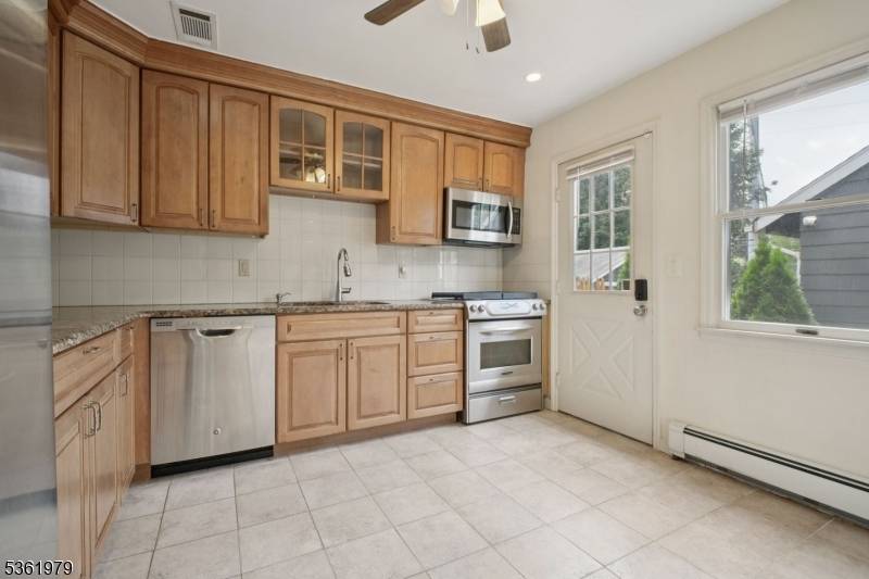 Welcome to 607 Grove Street, a unique 4 unit townhouse development in the Montclair Heights section of Clifton.