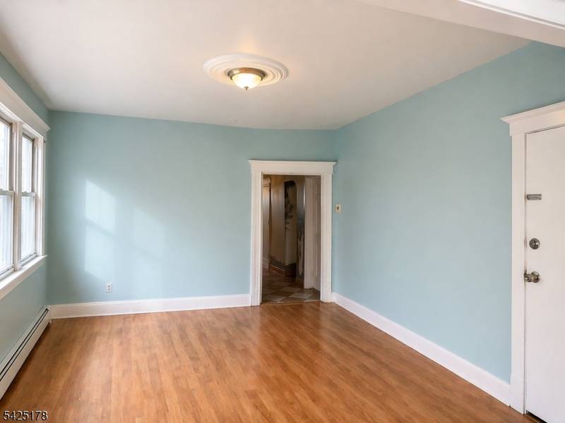 Welcome to this beautifully big lot sized 25X151 three family home in the heart of Bayonne, offering the perfect blend of comfort, convenience, and investment potential.