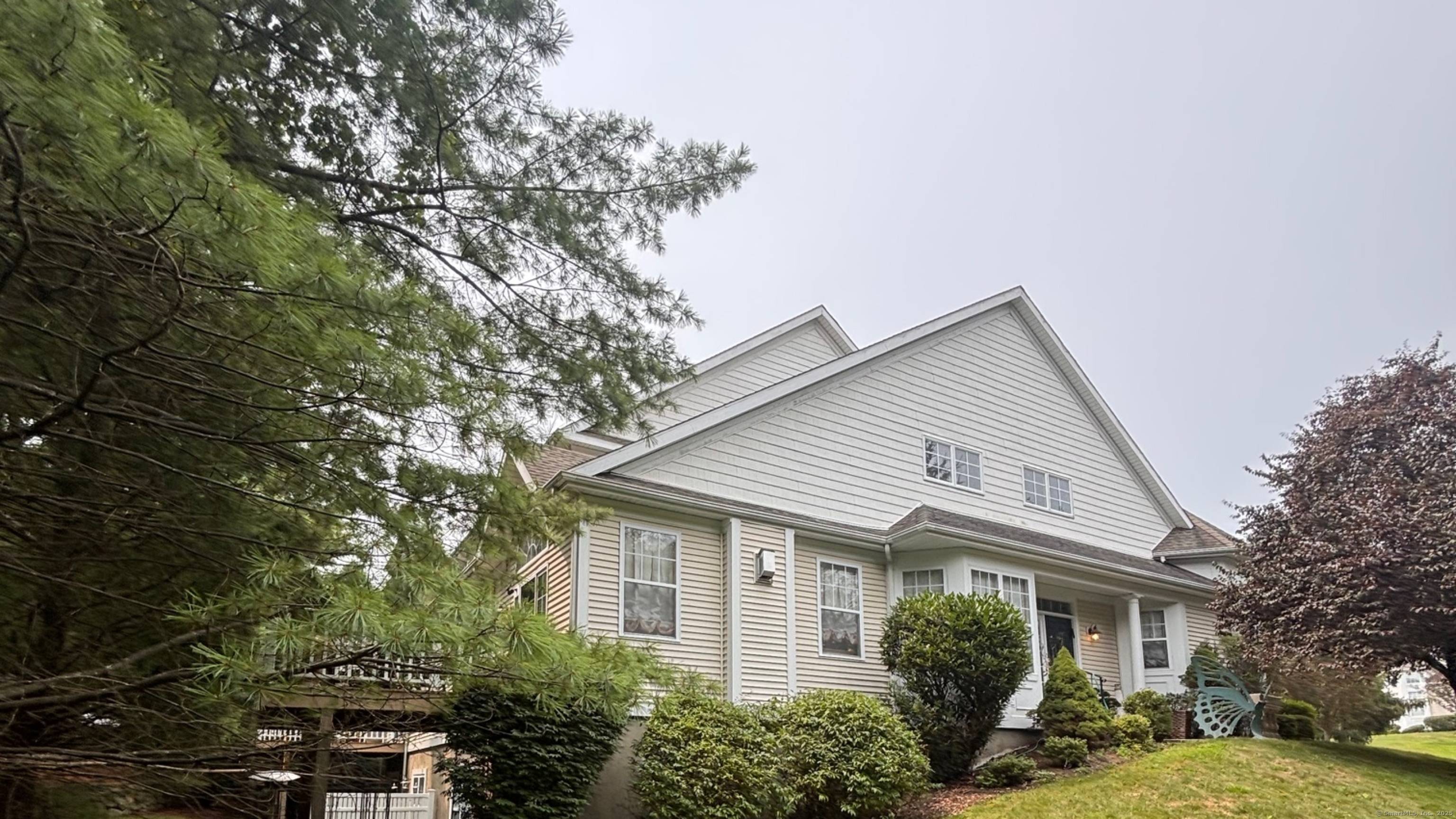 Welcome to this sunlit multi level Townhome in Luxury Woodland Hills !