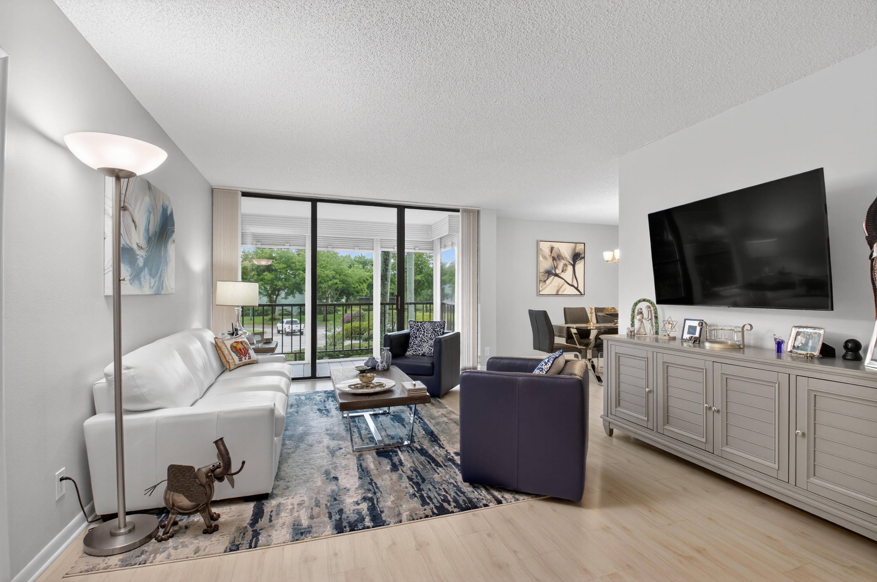 Move right in ! Beautiful 2 bedroom, 2 full bath unit with updated bathrooms, custom lighting and more !