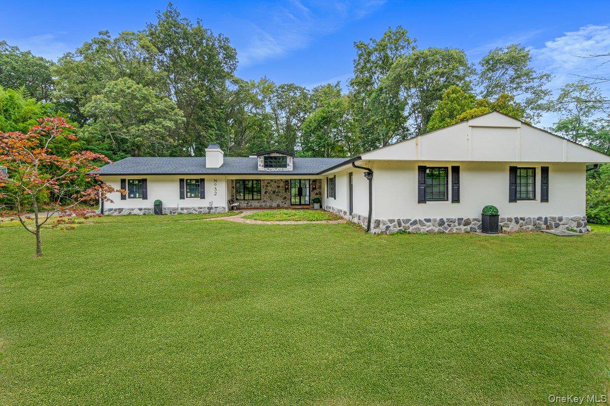 Step into this beautifully renovated modern expanded ranch that blends contemporary design with everyday comfort.