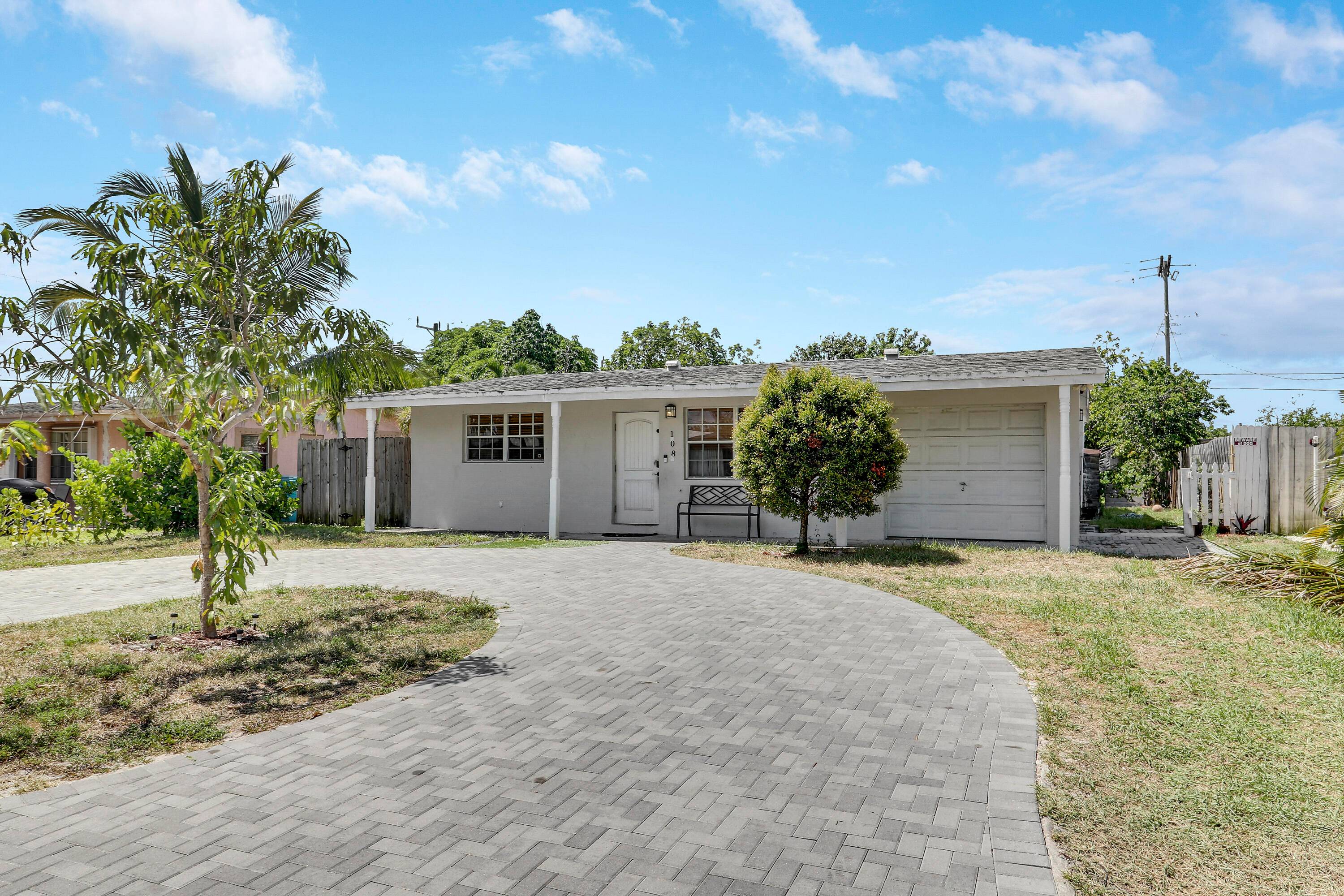 Welcome to 108 Arthur Court a charming 3 bedroom, 2 bath home nestled in the heart of Boynton Beach with a total of 1, 853 square feet.