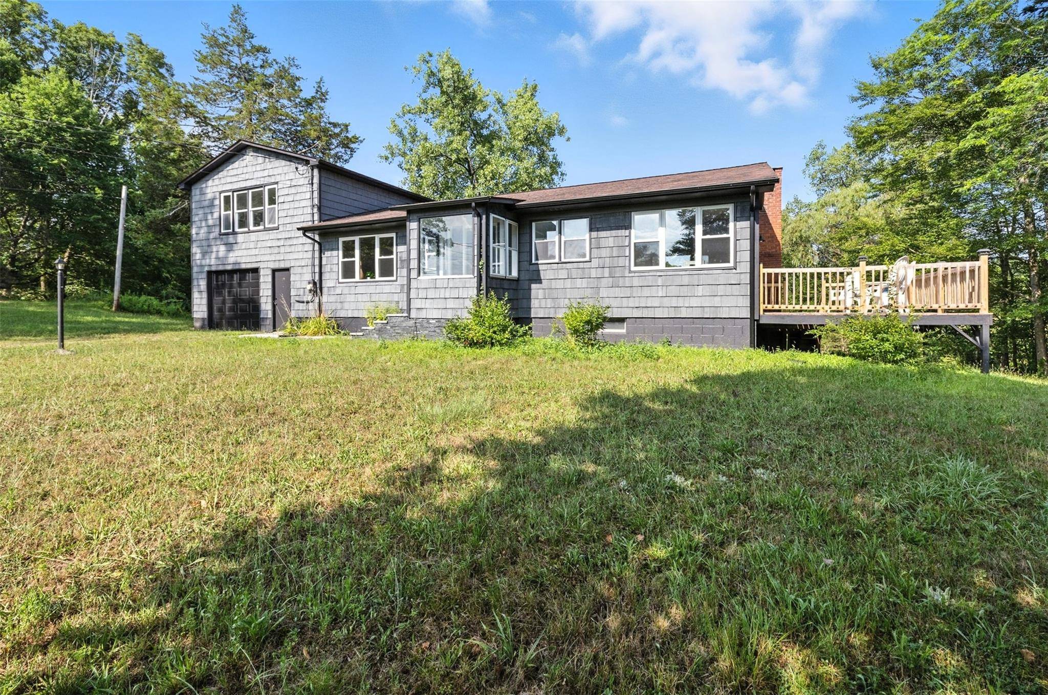 Welcome to your dream home in the heart of New York's Hudson Valley, where modern comfort meets rustic charm in perfect harmony.
