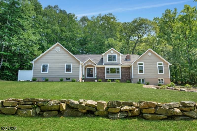 Experience the ease and comfort of ranch style living in the amenity rich lake community of Smoke Rise.
