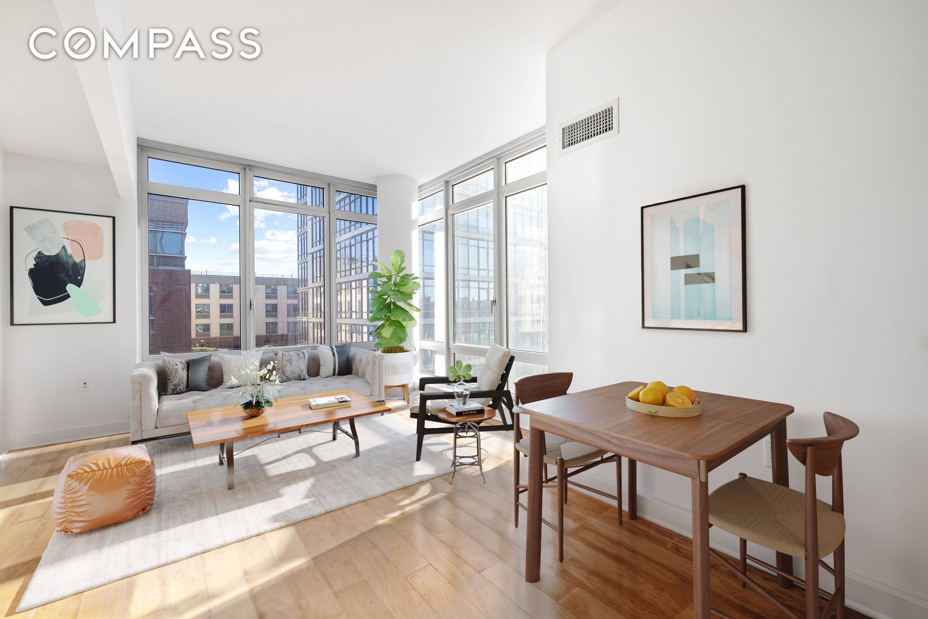 This spacious corner alcove studio boasts stunning open views and a sleek, modern design.