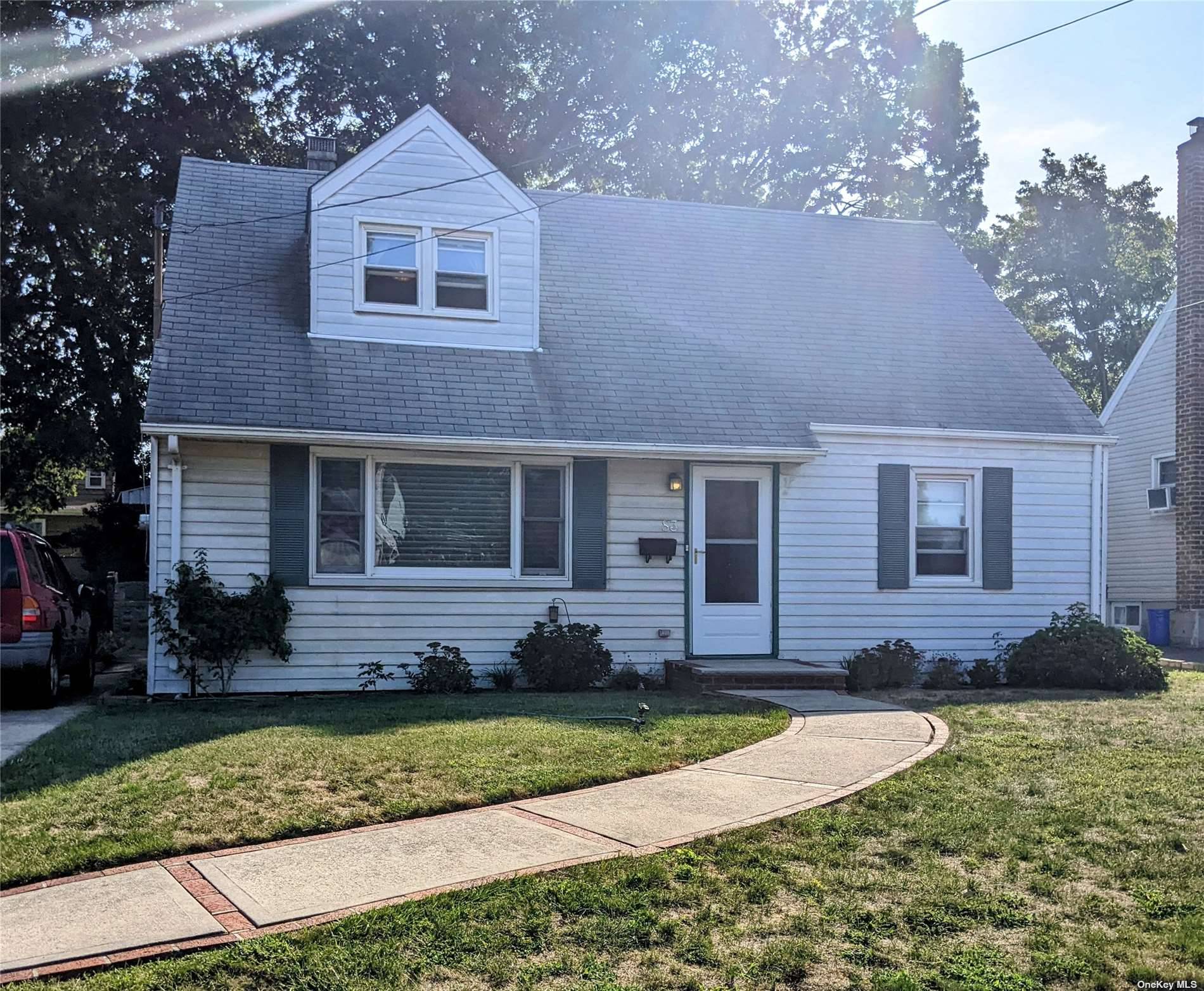 Charming 4 Bedroom 1 bath Cape nestled in the soul of Valley Stream in a quiet neighborhood.
