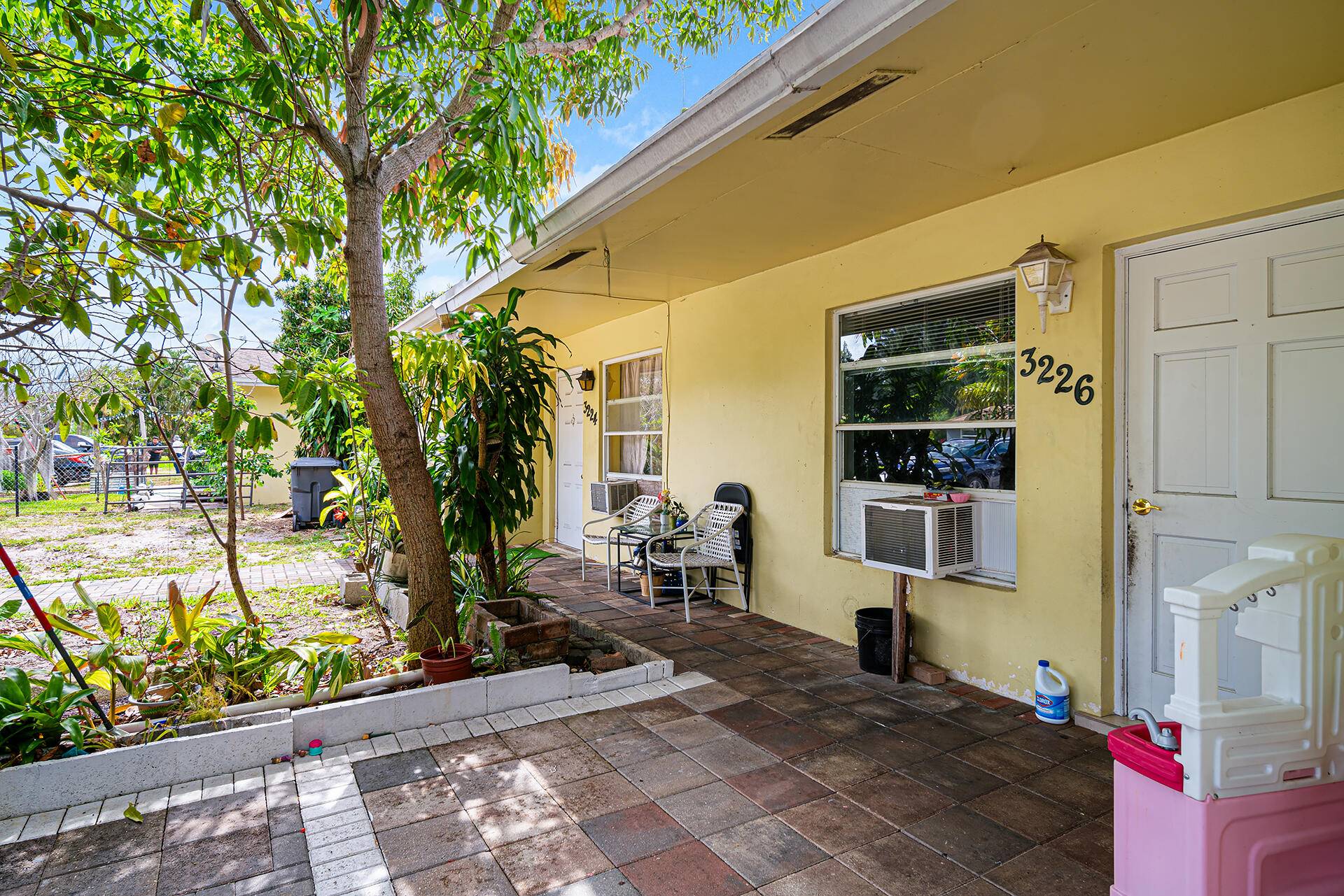Duplex close to JFK Hospital, John Prince Park, and I 95 in unincorporated Palm Beach County.