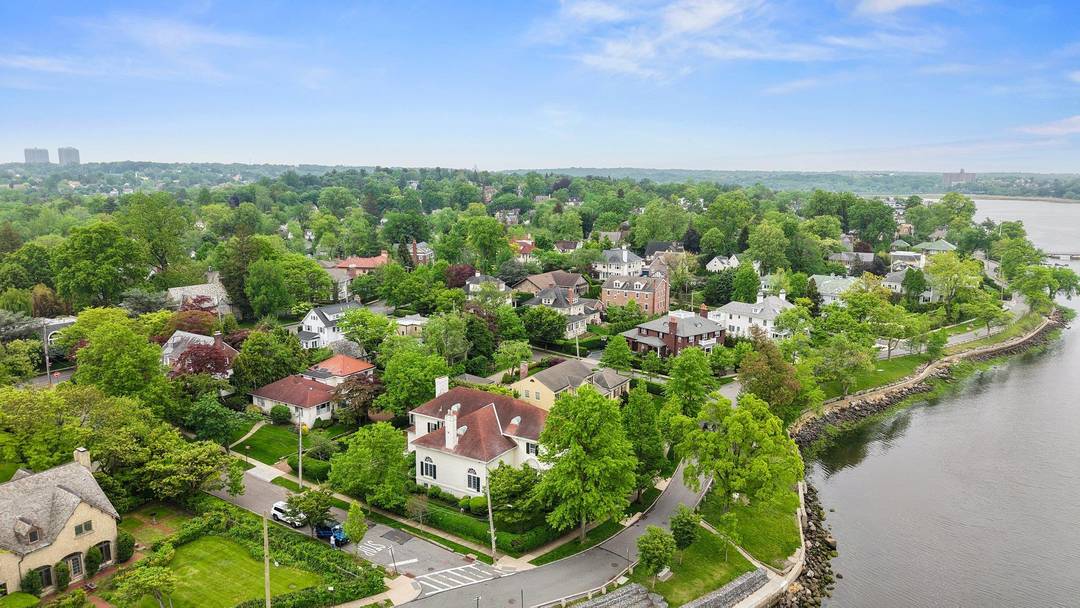 Timeless Waterfront Luxury At 1008 Shore Road In The Prestigious Douglaston Manor.