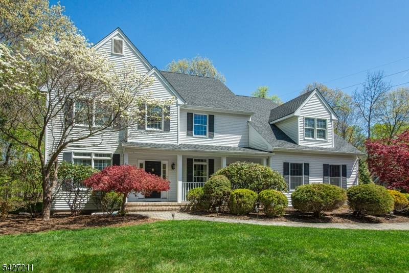 Spectacular Colonial home located in the desirable Center Grove section of Randolph offers exceptional curb appeal a welcoming front porch.