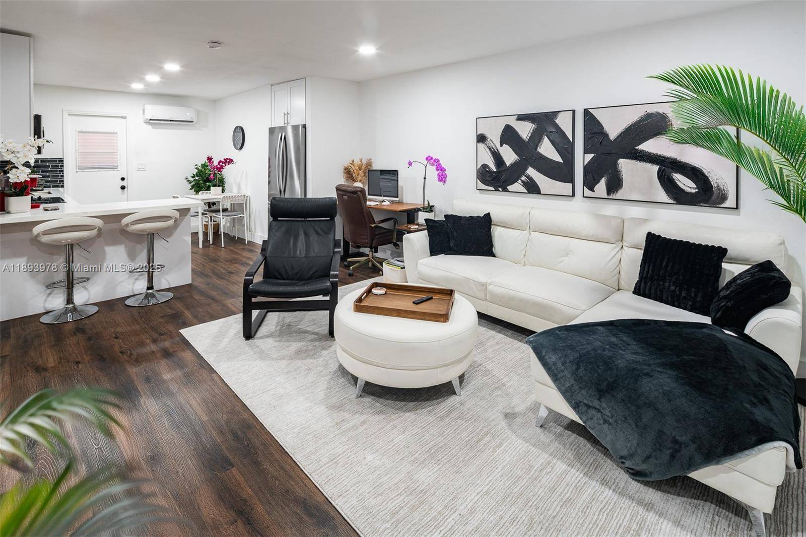 Turnkey, fully renovated Airbnb approved duplex in prime North Miami, delivering a 7 cap rate.