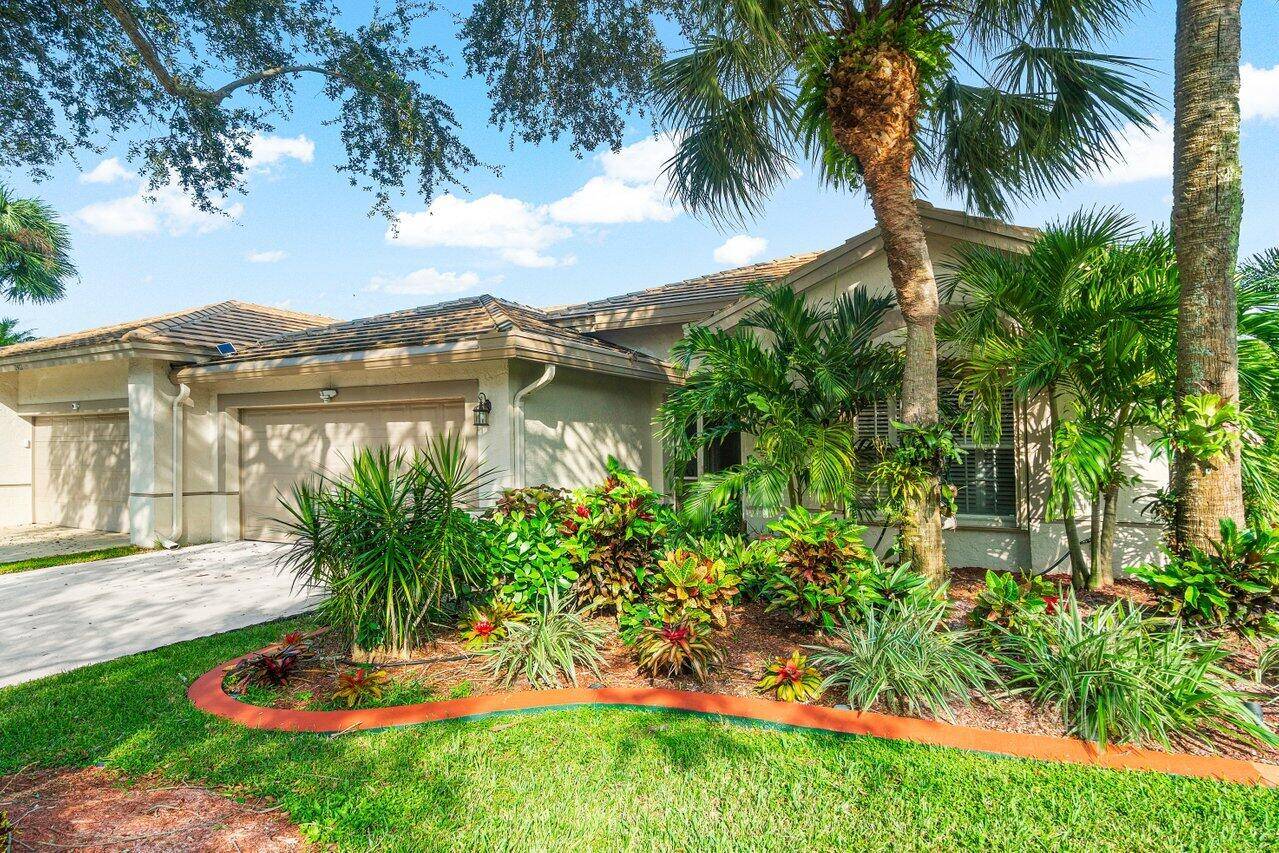Start off the new year with a LIKE NEW villa in the highly desired gated community of Waters Edge !