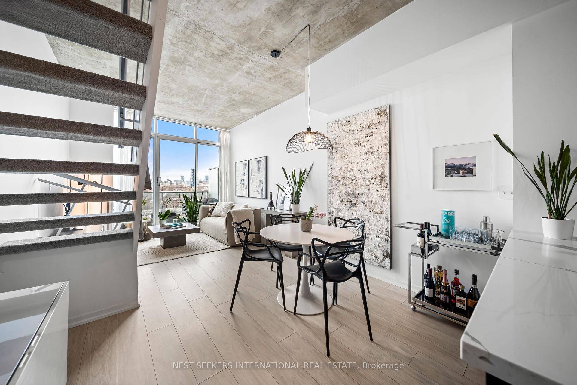 Bold design meets urban comfort in this bright and modern 2 bedroom loft in the award winning District Lofts, located in the heart of Toronto's Entertainment District.