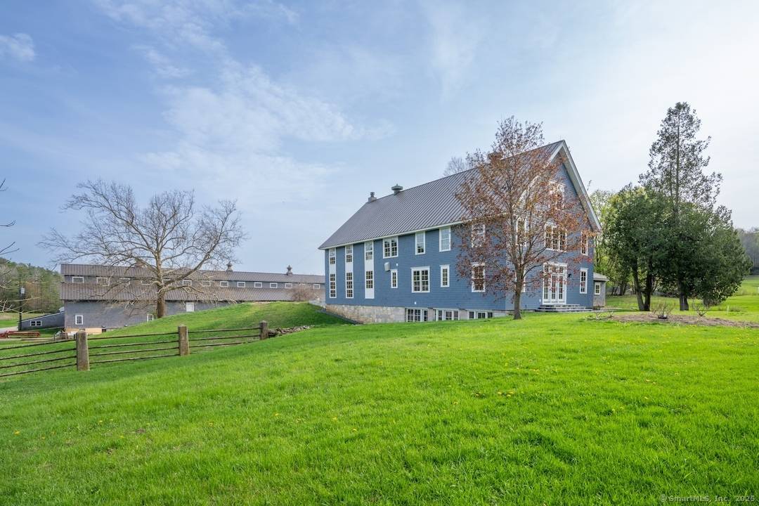 The post and beam residence showcases soaring ceilings and expansive windows that frame the spectacular landscape while highlighting the architectural character throughout.