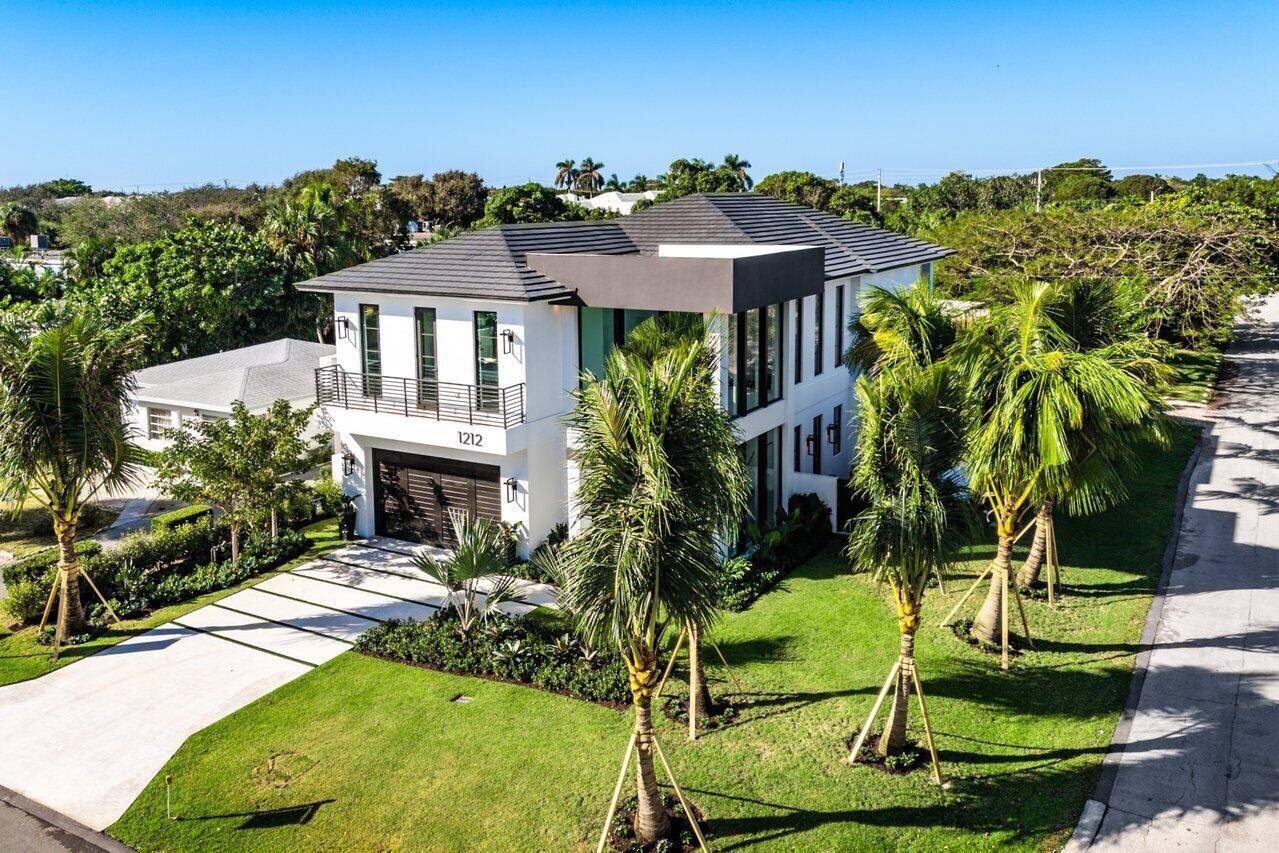 Juniper House, 1212 NE 8th Ave in Delray Beach ; the complete turn key experience in Delray Beach's coveted Palm Trail neighborhood.