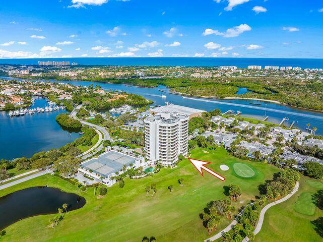 First floor luxury condominium on the golf course of Jonathan's Landing Country Club with panoramic fairway views and freshly painted interior !
