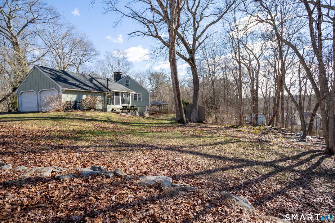 Private 2. 2 acre property with an in ground pool just minutes from Essex Village.
