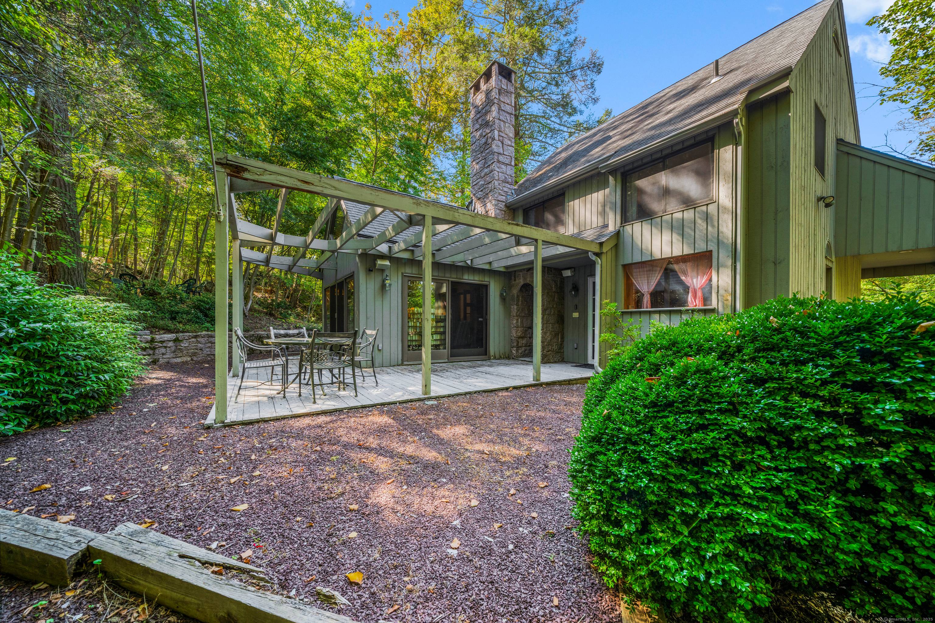 Welcome to 817 Lake Drive, a beautifully updated contemporary Colonial just steps from Quonnipaug Lake.