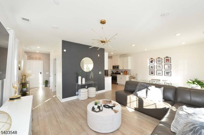 Welcome to this ultra modern townhome located in the sought after The Parke at Little Falls, freshly built just two years ago and offering a seamless blend of style, comfort, ...