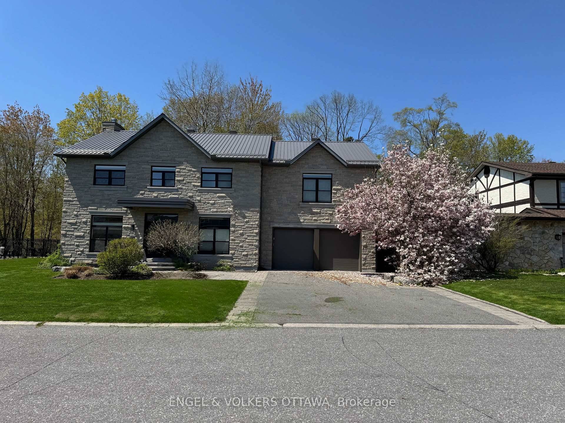 Discover the pinnacle of luxury living at 15 Camwood Crescent, a stunning custom built home with just under 5000 sq.
