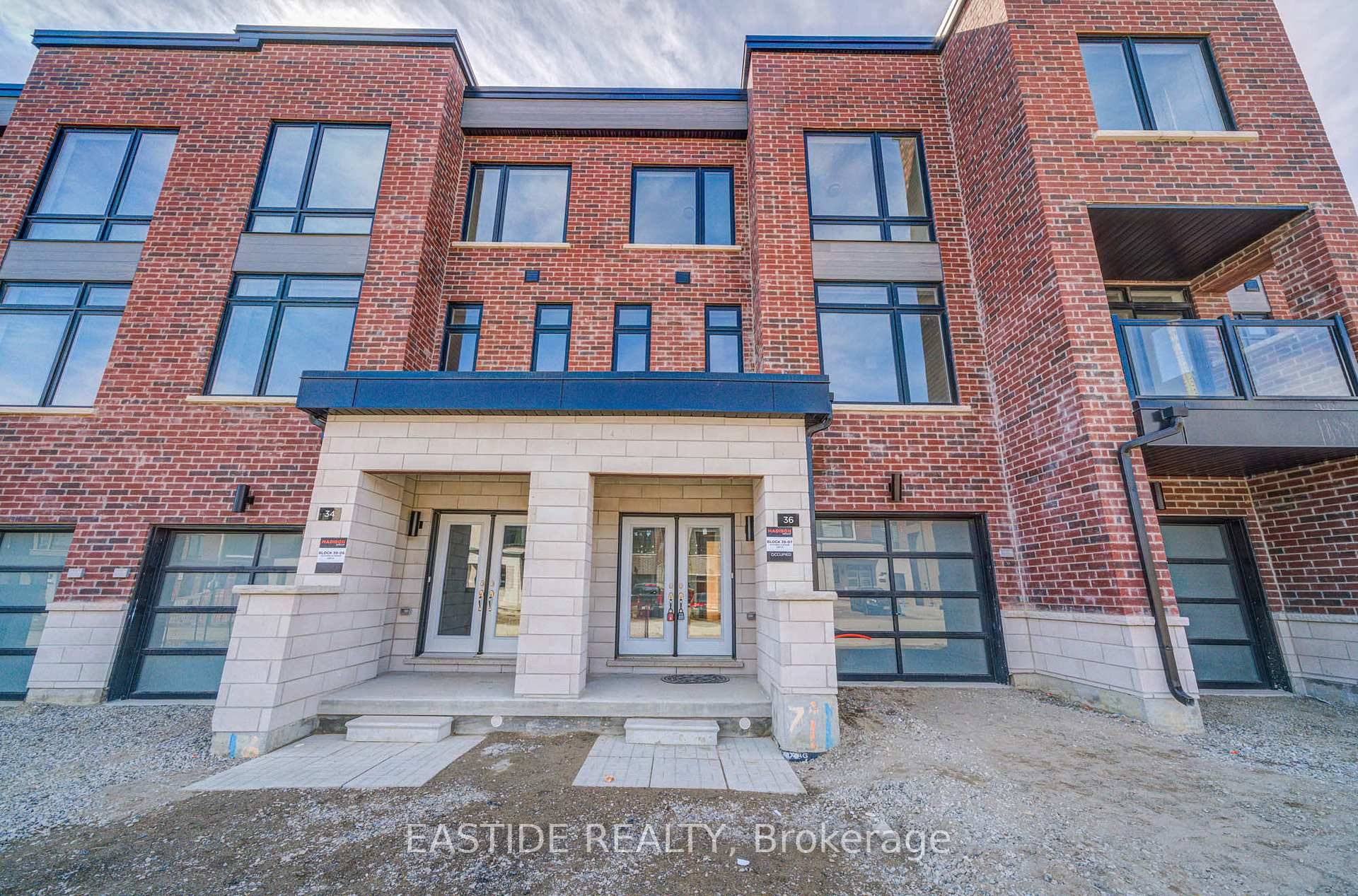 Welcome to this brand new stunning, fully upgraded, three story freehold townhouse, bathed in natural light and designed for modern luxury living.
