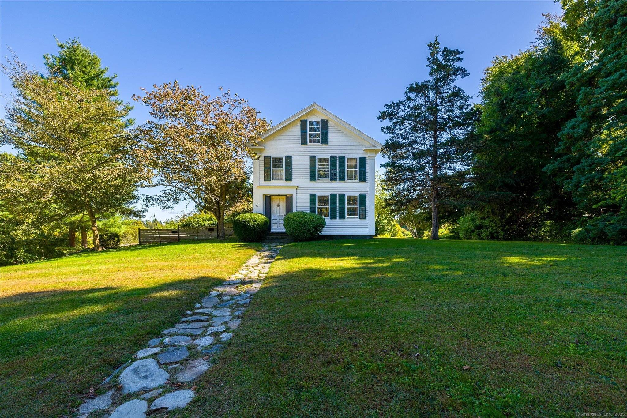 Step back in time with this one of a kind 1830 Greek Revival farmhouse, offering 2, 150 sq ft of character and charm on a picturesque 0.