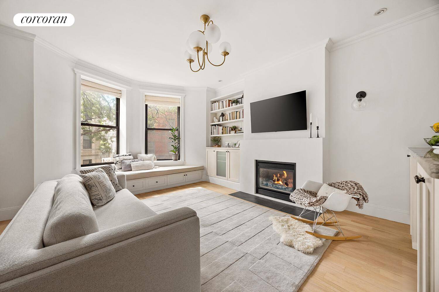 This beautifully appointed 3 bedroom, 2 bathroom condominium encompasses an entire floor nearly 1, 500 square feet of a striking townhouse in central Park Slope.